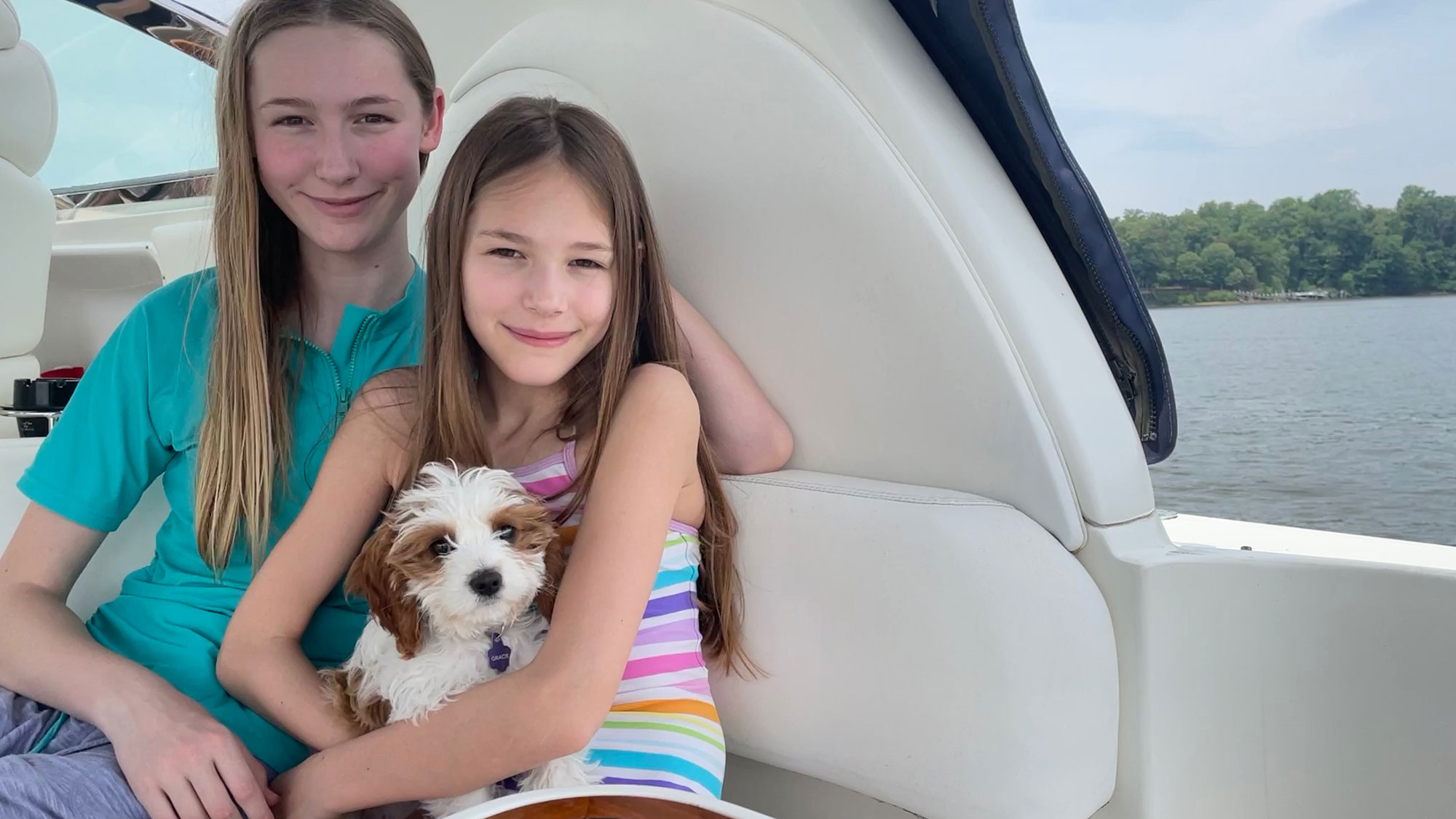 boating kids dog